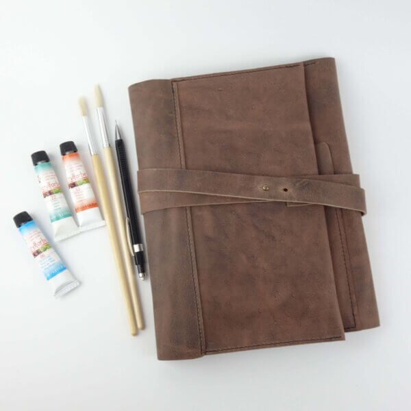 pochette d'artiste en cuir